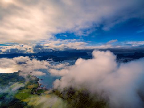 Scenic aerial view of Lofoten islands from clouds