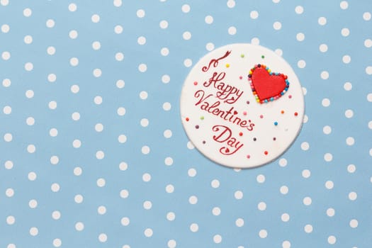 Valentine's day love message, handmade, isolated on blue with white dots background (polka dot)