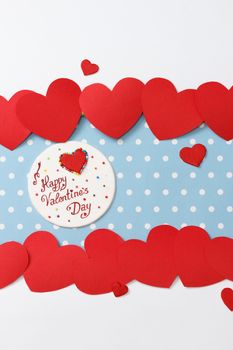Valentine's day love message, handmade, isolated on blue with white dots background (polka dot) with white borders