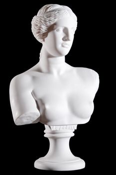 White marble bust, part of classic statue "Aphrodite of Milos" isolated on black background