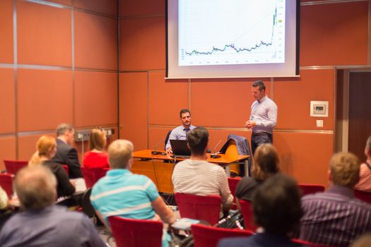 Speakers Giving a Talk at Business Meeting. Audience in the conference hall. Business and Entrepreneurship concept.