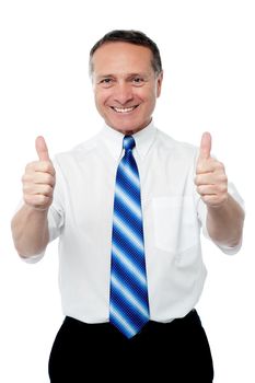 Senior male executive showing double thumbs ups