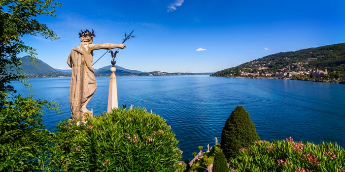 Isola Bella is located in the middle of Lake Maggiore you can get with liners or private just 5 minutes off the town of Stresa. 
The island owes its fame to the Borromeo family who built a magnificent palace with a beautiful garden.