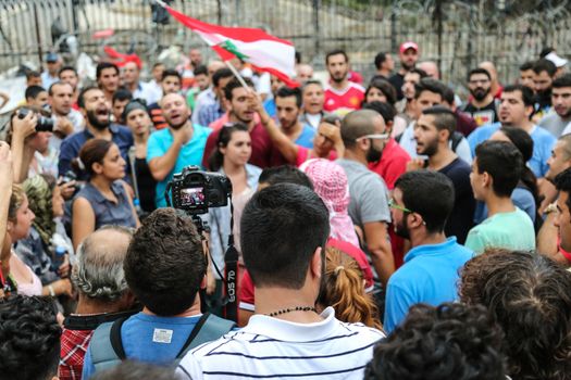 LEBANON, Beirut: As part of the ongoing #YouStink movement, protesters rally in Beirut, Lebanon on September 17, 2015, calling for the release of activists who have been arrested. On September 16, close to 40 were reportedly arrested. The ongoing waste-management crisis was caused by the closure of an over-capacity landfill on July 17, with the government reportedly failing to find an alternative site for the city's waste in time.