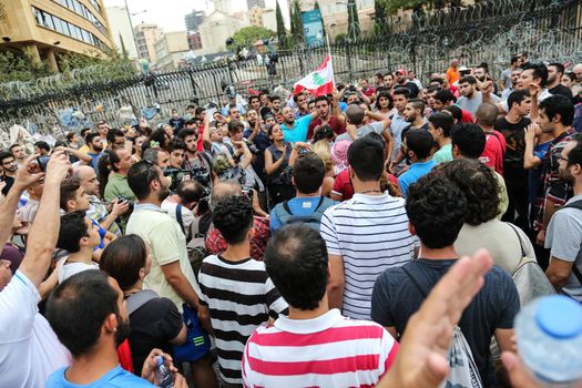 LEBANON, Beirut: As part of the ongoing #YouStink movement, protesters rally in Beirut, Lebanon on September 17, 2015, calling for the release of activists who have been arrested. On September 16, close to 40 were reportedly arrested. The ongoing waste-management crisis was caused by the closure of an over-capacity landfill on July 17, with the government reportedly failing to find an alternative site for the city's waste in time.