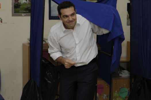 GREECE, Athens: Leader of left-wing party Syriza and former Prime minister Alexis Tsipras leaves the polling booth in his polling station in Athens on September 20, 2015 during Greek General Election first row. The election is the second Greek General Election within a year.