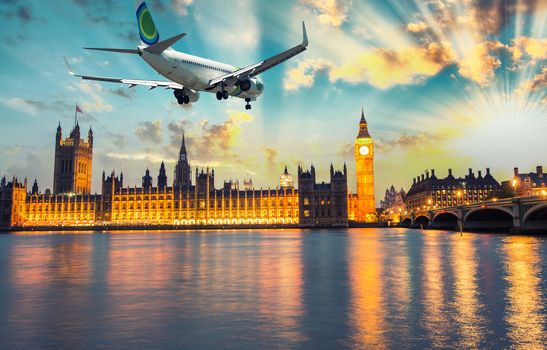 Airplane over Westminster and Big Ben, London - UK.