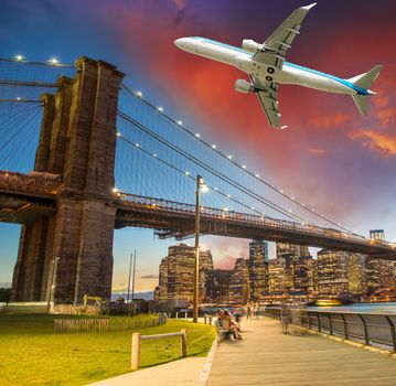 Aircraft over New York City - Tourism and vacation concept.