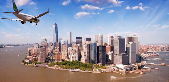 Aircraft overflying New York City skyline.