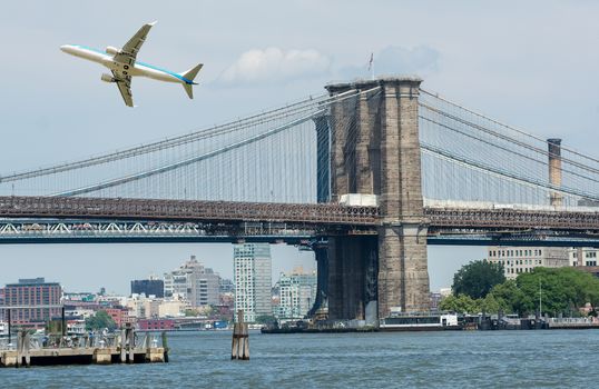 Aircraft overflying New York City skyline.