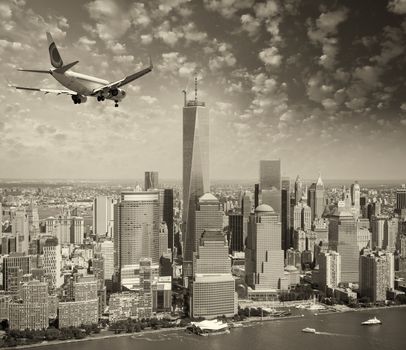 Aircraft overflying New York City skyline.