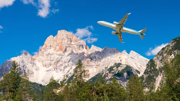 Airplane overflying mountains.