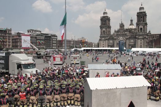 MEXICO, Mexico City: Firefighters are seen on Constitution Square in Mexico City on September 19, 2015 as part of the animations to commemorate 1985's earthquake.