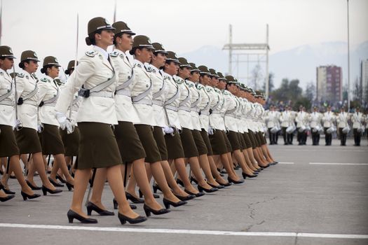 CHILE, Santiago : Chilean President Michelle Bachelet (C) takes part in a military parade in Santiago, on September 19, 2015, on the day of the 205th anniversary of Chile's independence