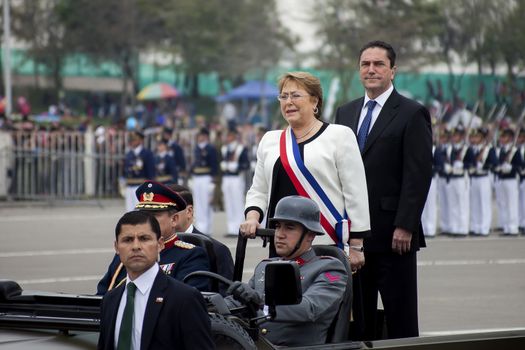 CHILE, Santiago : Chilean President Michelle Bachelet (C) takes part in a military parade in Santiago, on September 19, 2015, on the day of the 205th anniversary of Chile's independence