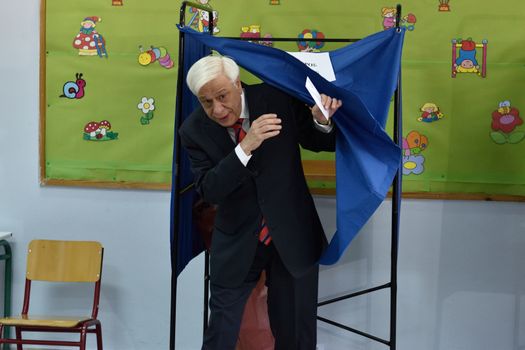 GREECE, Athens: Prokopis Pavlopoulos votes at the county's snap general elections in the Neo Psychiko region of Athens on September 20, 2015.  Greek voters head to the polls today in a tightly fought general election which is expected to be nail-bitingly close. 	 After just seven months of power, Alexis Tsipras called these snap elections to win a new mandate to implement Greece's new bailout plan. 