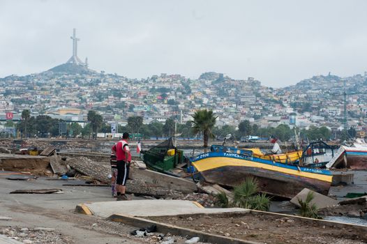 CHILE, Coquimbo: The coastal town of Coquimbo struggles to pick up the pieces on September 19, 2015 after Wednesday's 8.3 magnitude quake ripped through the region.  Residents have begun clearing up after what was the country's sixth most powerful recorded earthquake. At least 11 people have died and hundreds have been displaced since the disaster. 