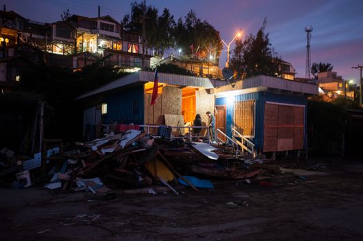 CHILE, Coquimbo: The coastal town of Coquimbo struggles to pick up the pieces on September 19, 2015 after Wednesday's 8.3 magnitude quake ripped through the region.  Residents have begun clearing up after what was the country's sixth most powerful recorded earthquake. At least 11 people have died and hundreds have been displaced since the disaster. 