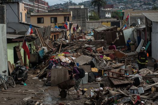 CHILE, Coquimbo: The coastal town of Coquimbo struggles to pick up the pieces on September 19, 2015 after Wednesday's 8.3 magnitude quake ripped through the region.  Residents have begun clearing up after what was the country's sixth most powerful recorded earthquake. At least 11 people have died and hundreds have been displaced since the disaster. 