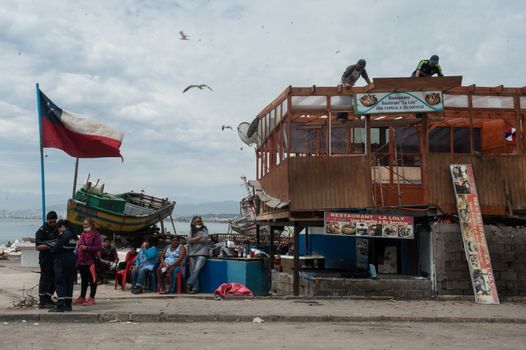 CHILE, Coquimbo: The coastal town of Coquimbo struggles to pick up the pieces on September 19, 2015 after Wednesday's 8.3 magnitude quake ripped through the region.  Residents have begun clearing up after what was the country's sixth most powerful recorded earthquake. At least 11 people have died and hundreds have been displaced since the disaster. 