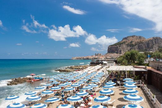 Cefalù (Italy), with the beach full of umbrellas