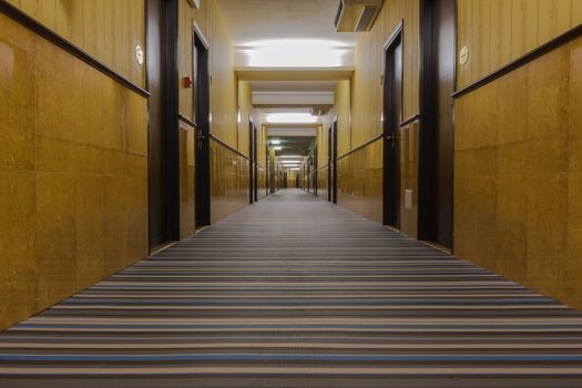 Corridor view of a new Italian hotel .