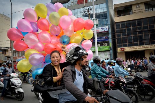 NEPAL, Kathmandu: After years of debate, Nepal adopted a new constitution on September 20, 2015, prompting scores of residents to celebrate near the constituent assembly building in Kathmandu. Out of the 598 members of the Constituent Assembly, 507 voted for the new constitution, 25 voted against, and 66 abstained in a vote on September 16, 2015. The event was marked with protests organized by parties of the Tharu and Madhesi ethnic communities, which according to Newzulu contributor Anish Gujarel led to violence in Southern Nepal.