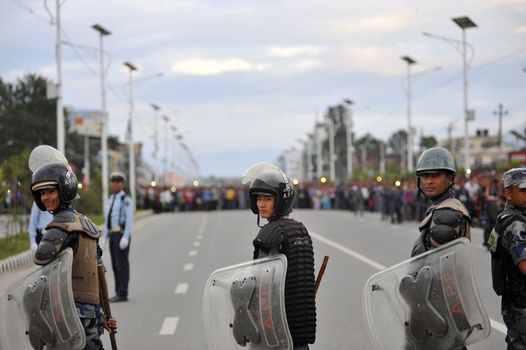 NEPAL, Kathmandu: After years of debate, Nepal adopted a new constitution on September 20, 2015, prompting scores of residents to celebrate near the constituent assembly building in Kathmandu. Out of the 598 members of the Constituent Assembly, 507 voted for the new constitution, 25 voted against, and 66 abstained in a vote on September 16, 2015. The event was marked with protests organized by parties of the Tharu and Madhesi ethnic communities, which according to Newzulu contributor Anish Gujarel led to violence in Southern Nepal.