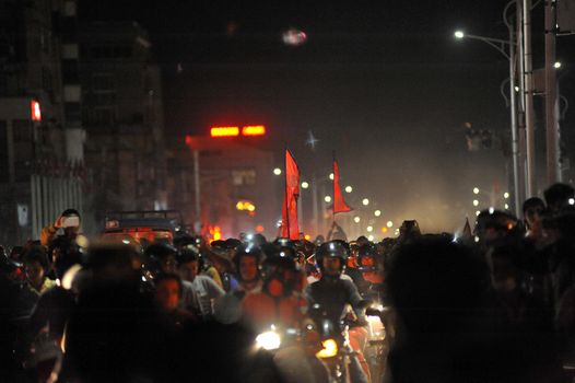 NEPAL, Kathmandu: After years of debate, Nepal adopted a new constitution on September 20, 2015, prompting scores of residents to celebrate near the constituent assembly building in Kathmandu. Out of the 598 members of the Constituent Assembly, 507 voted for the new constitution, 25 voted against, and 66 abstained in a vote on September 16, 2015. The event was marked with protests organized by parties of the Tharu and Madhesi ethnic communities, which according to Newzulu contributor Anish Gujarel led to violence in Southern Nepal.