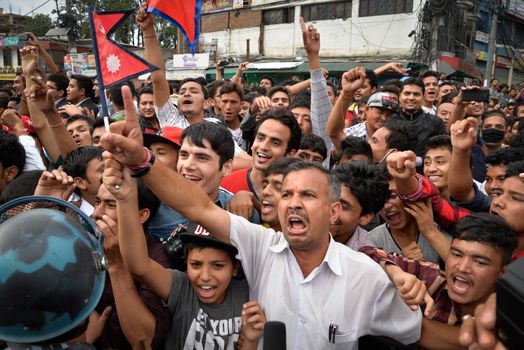 NEPAL, Kathmandu: After years of debate, Nepal adopted a new constitution on September 20, 2015, prompting scores of residents to celebrate near the constituent assembly building in Kathmandu. Out of the 598 members of the Constituent Assembly, 507 voted for the new constitution, 25 voted against, and 66 abstained in a vote on September 16, 2015. The event was marked with protests organized by parties of the Tharu and Madhesi ethnic communities, which according to Newzulu contributor Anish Gujarel led to violence in Southern Nepal.