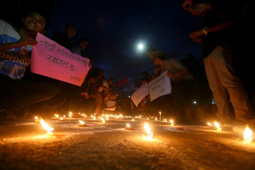 NEPAL, Kathmandu: After years of debate, Nepal adopted a new constitution on September 20, 2015, prompting scores of residents to celebrate near the constituent assembly building in Kathmandu. Out of the 598 members of the Constituent Assembly, 507 voted for the new constitution, 25 voted against, and 66 abstained in a vote on September 16, 2015. The event was marked with fireworks and fesitivities, but also with protests organized by parties of the Tharu and Madhesi ethnic communities.