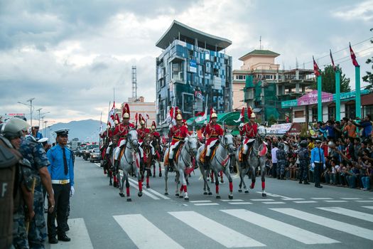 NEPAL, Kathmandu: After years of debate, Nepal adopted a new constitution on September 20, 2015, prompting scores of residents to celebrate near the constituent assembly building in Kathmandu. Out of the 598 members of the Constituent Assembly, 507 voted for the new constitution, 25 voted against, and 66 abstained in a vote on September 16, 2015. The event was marked with fireworks and festivities, but also with protests organized by parties of the Tharu and Madhesi ethnic communities.