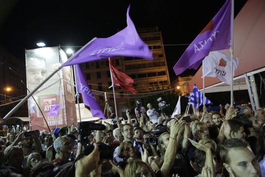 GREECE, Athens: Syriza supporters celebrate in the streets as Syriza leader Alexis Tsipras addressed supporters in Athens after claiming victory in Greece's parliamentary election on September 20, 2015.