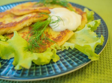 potato pankakes with cream frache and dill - draniki