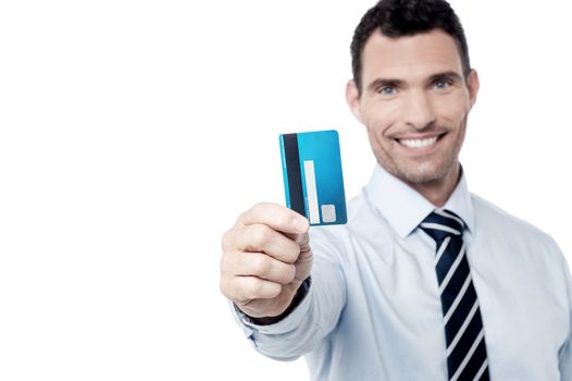 Corporate man showing credit card to camera