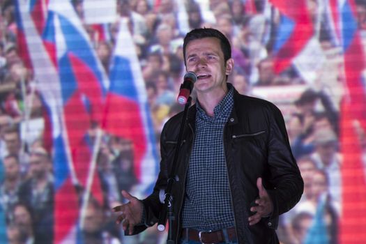 RUSSIA, Moscow: Activist and liberal politician Ilya Yashin addressed Russian opposition activists as they rallied in Moscow on September 20, 2015, in the wake of regional elections that widely favored the ruling United Russia party and prompted accusations of vote rigging. The Meeting to Change Power protest, organised by prominent anti-corruption campaigner Alexei Navalny, drew an estimated 2,000-4,000 people, well short of estimates in advance of the rally. 