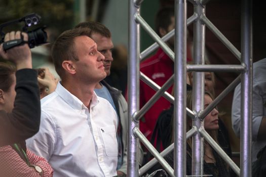 RUSSIA, Moscow:  Activist Alexei Navalny addressed Russian opposition activists as they rallied in Moscow on September 20, 2015, in the wake of regional elections that widely favored the ruling United Russia party and prompted accusations of vote rigging. The Meeting to Change Power protest, organised by prominent anti-corruption campaigner Navalny, drew an estimated 2,000-4,000 people, well short of estimates in advance of the rally. 