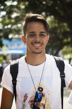 CUBA, Havana: A young Cuban is pictured as Pope Francis celebrates mass in Revolution Square, in Havana, on September 20, 2015. Pope Francis is on the first full day of his three day visit to Cuba, where he meets President Raul Castro and Fidel Castro and hold Mass in Revolution Square before travelling to Holguin, Santiago de Cuba and El Cobre, then onwards to the United States.