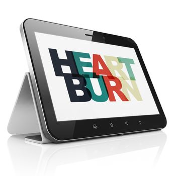 Healthcare concept: Tablet Computer with Painted multicolor text Heartburn on display