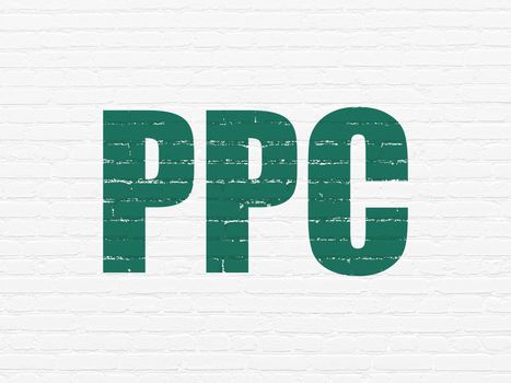 Marketing concept: Painted green text PPC on White Brick wall background