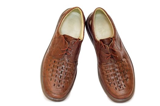 Comfortable leather men's shoes brown. Presented on a white background.