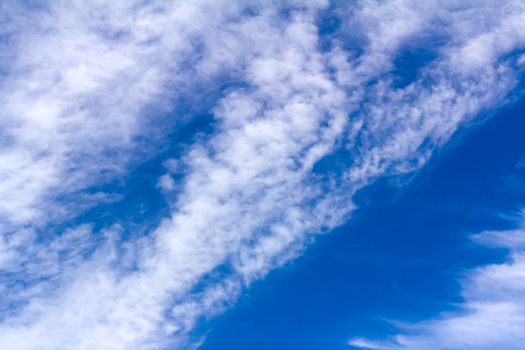 Blue sky and white fluffy clouds.