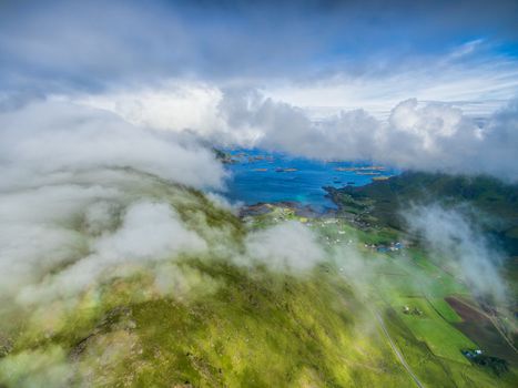 Low clouds flying above scenic Lofoten islands in Norway