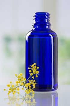 Blue bottle of essential oil