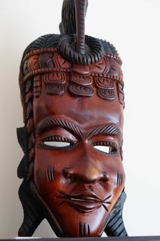 African brown wooden face mask
