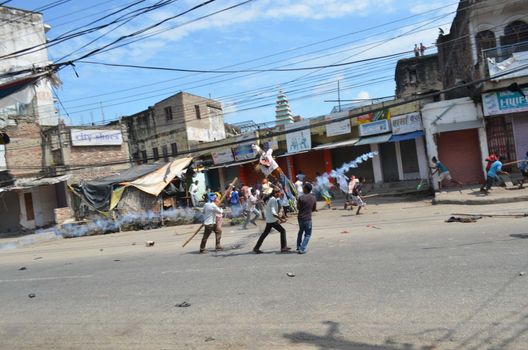 NEPAL, Terai: Nepal announced its first democratic constitution, sparking outrage among the Madeshi and Tharu ethnic communities on September 20, 2015. 	Demonstrators have staged protests in different parts of the Terai region, demanding a new demarcation of the state so that they are more fairly represented under the new constitution. 	The riots became violent and security personnel opened fire on protesters, killing at least one and leaving more than a dozen injured on September 20. 