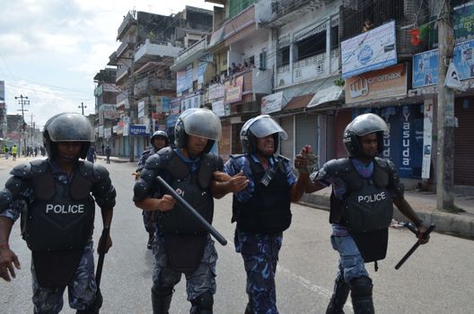 NEPAL, Terai: Nepal announced its first democratic constitution, sparking outrage among the Madeshi and Tharu ethnic communities on September 20, 2015. 	Demonstrators have staged protests in different parts of the Terai region, demanding a new demarcation of the state so that they are more fairly represented under the new constitution. 	The riots became violent and security personnel opened fire on protesters, killing at least one and leaving more than a dozen injured on September 20. 