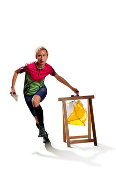 Woman punching at control point, taking part in orienteering competitions. Isolated on white. File contains clipping path of woman and shadows