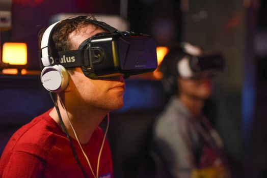 CANADA, Toronto: An attendee wears a virtual reality headset at the Festival of International Virtual and Augmented Reality Stories on September 19,2015.  	The festival was an exhibition of virtual reality and augmented films that are experienced through a virtual reality headset.