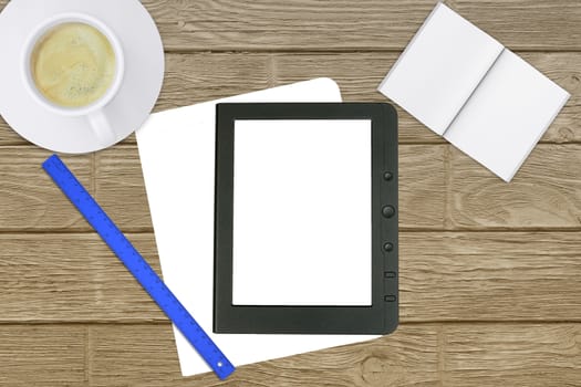 Tablet, ruler with cup of coffee on office table